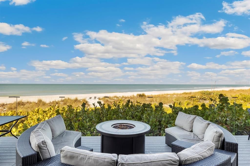 Comfortable seating with fire pit on the china deck off the Main Dining Room