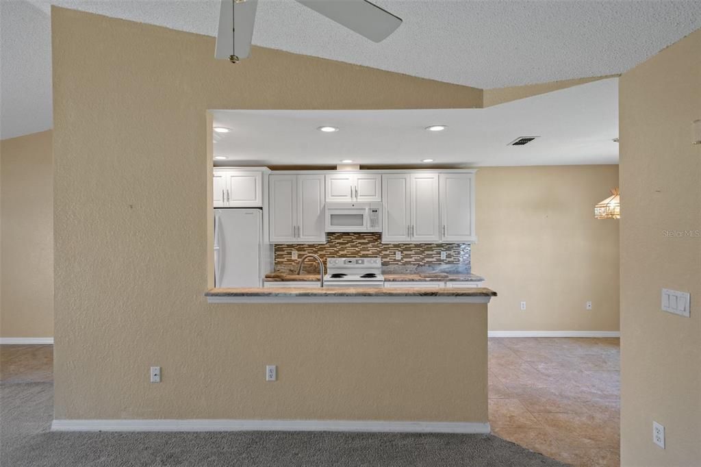 dining facing kitchen