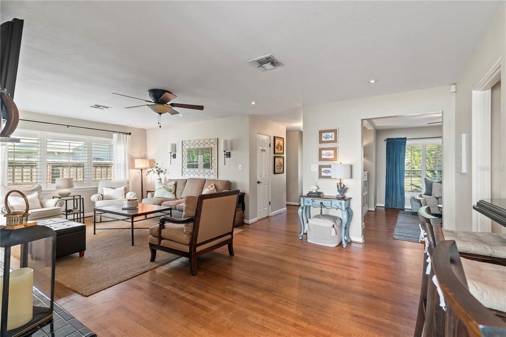 Open floor plan- living room with views into the family room and kitchen