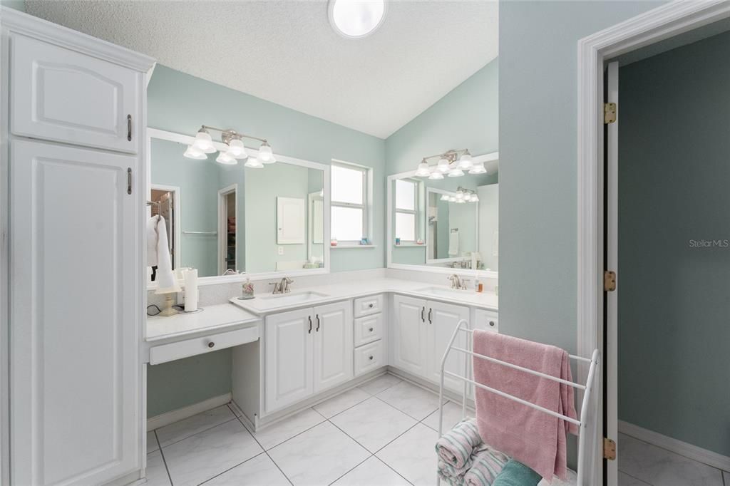 Quartz counters and dual sinks make the primary bath a special place.