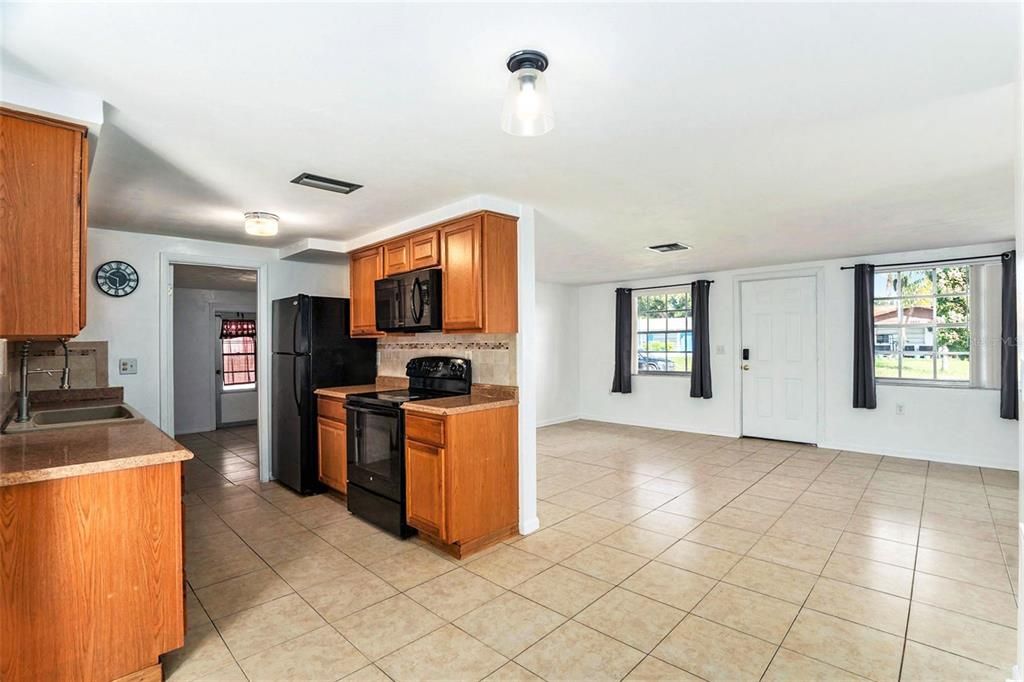 There is plenty of room for a dining table next to the kitchen!