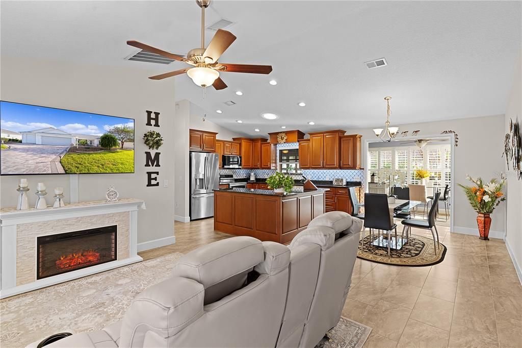 VIEW OF OPEN CONCEPT LIVING & DINING ROOMS, KITCHEN WITH "L" SHAPED ISLAND