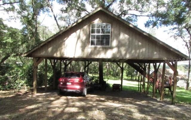 carport with living space above