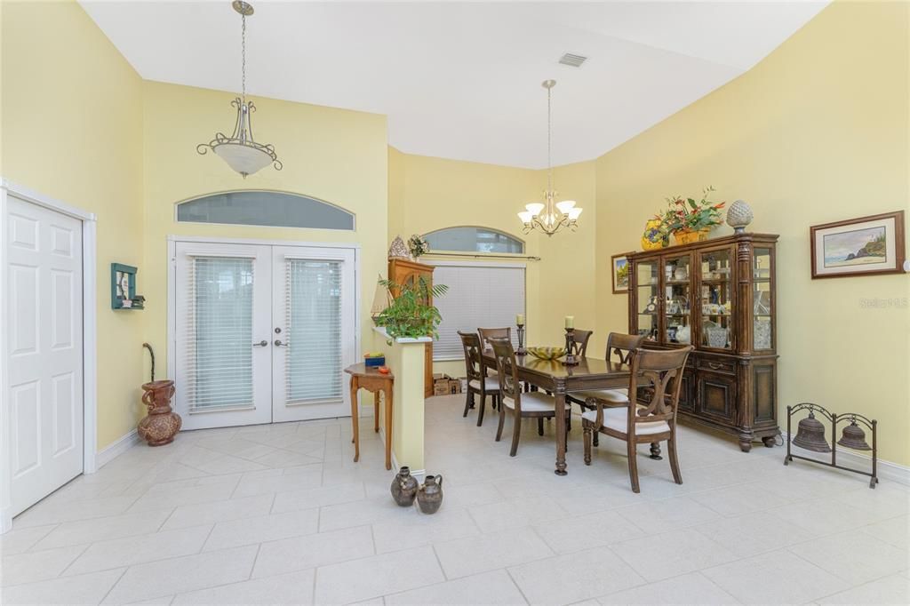 Stunning porcelain floors enhance this living space which can accomodate a full dining room for entertaining