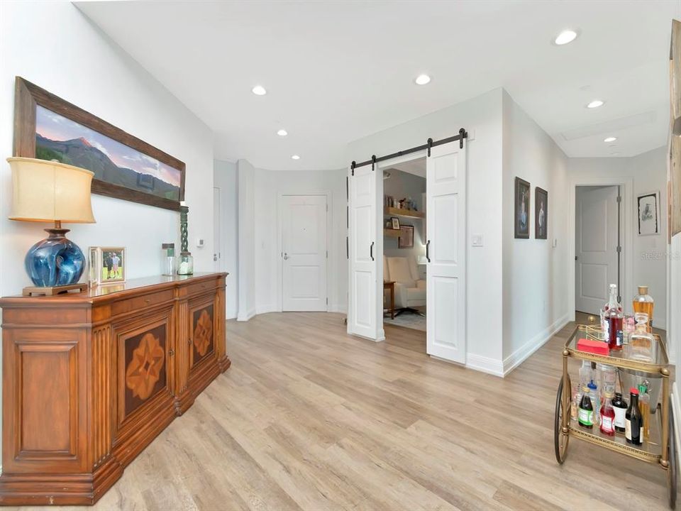 Enry foyer with glimpse into home office