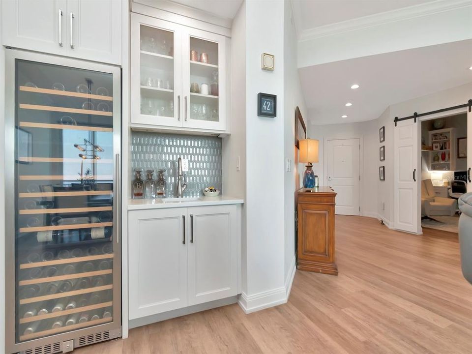 Wet bar with 168 bottle wine refrigerator