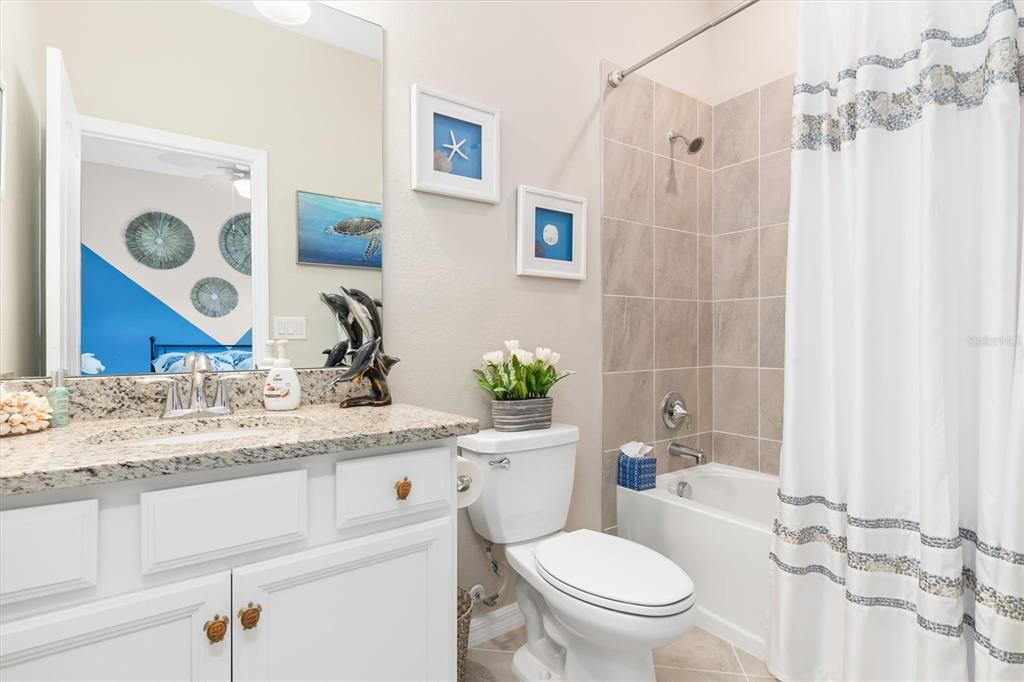 Shower and tub in bathroom 2.