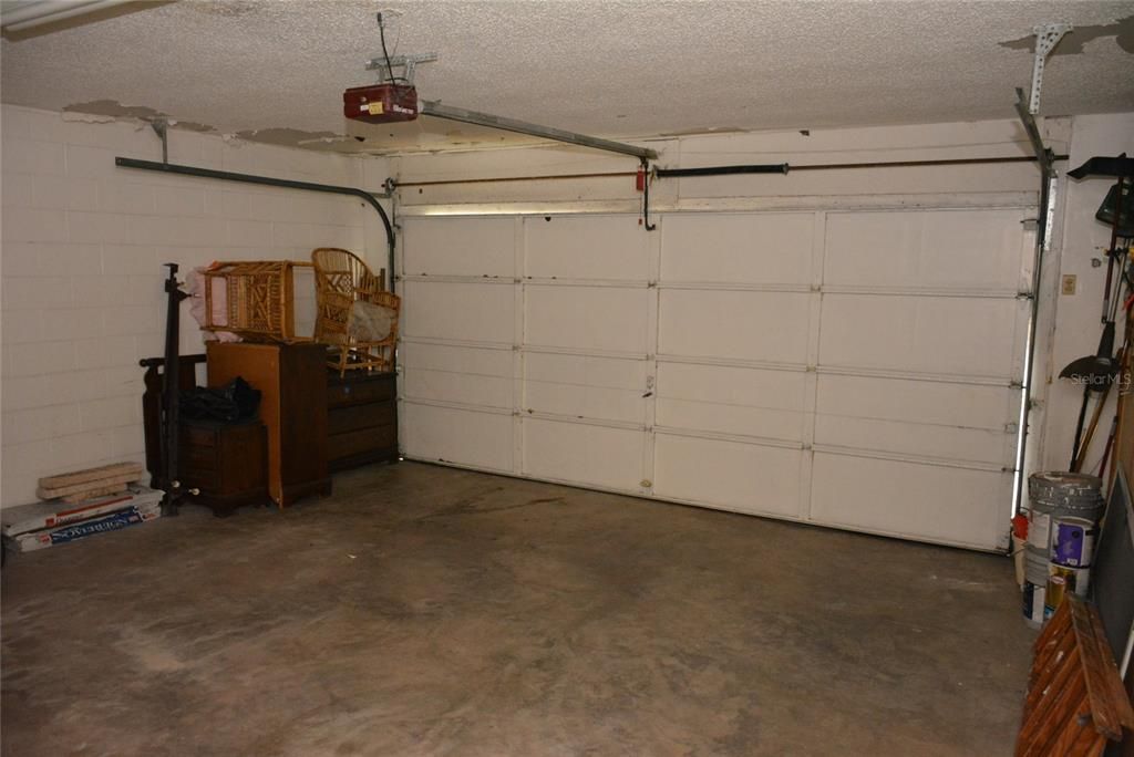 Garage is 19x19 with a door opener