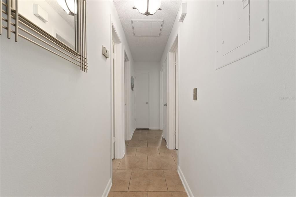 hallway, at the end to the left is the primary bedroom