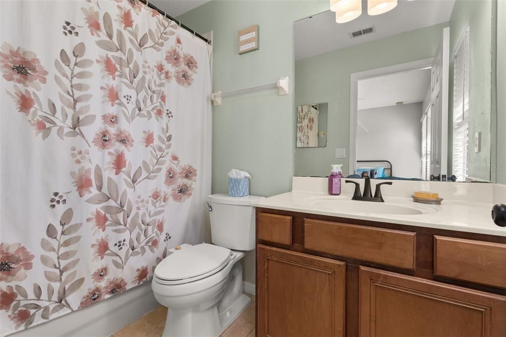 Shower/bathtub combination in primary suite #2