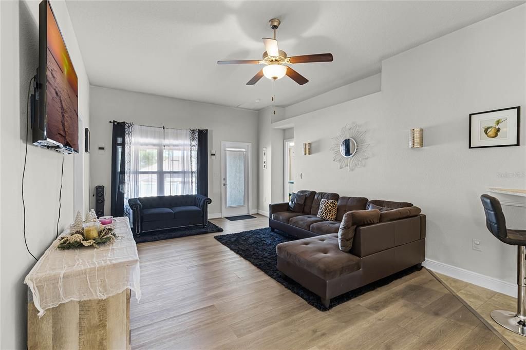 Spacious Living Room With Bedroom Access