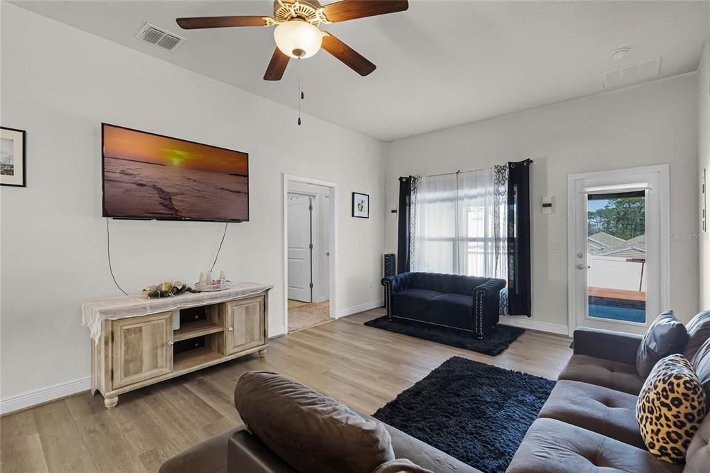 Spacious Living Room With Bedroom Access