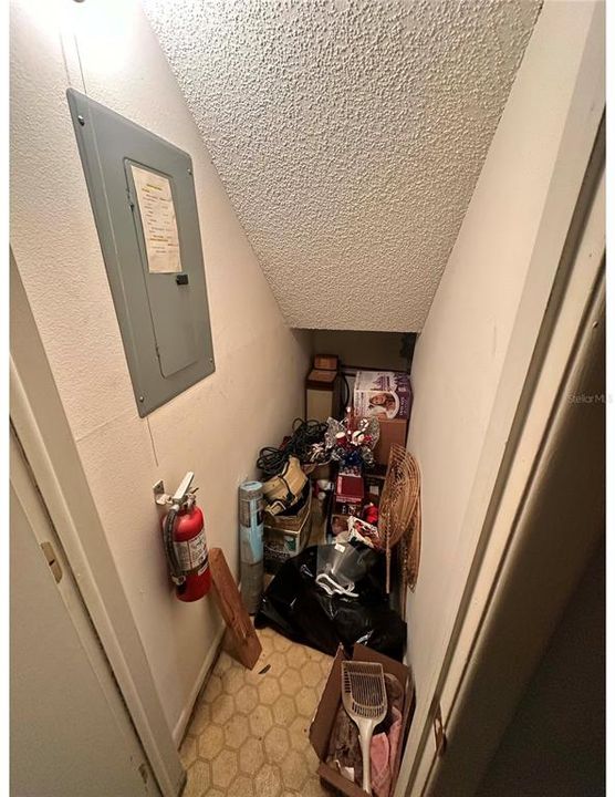 under staircase closet