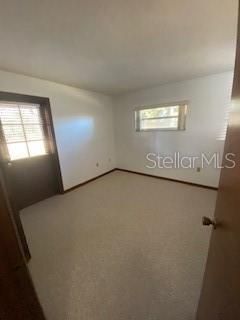 Bedroom with door to outside