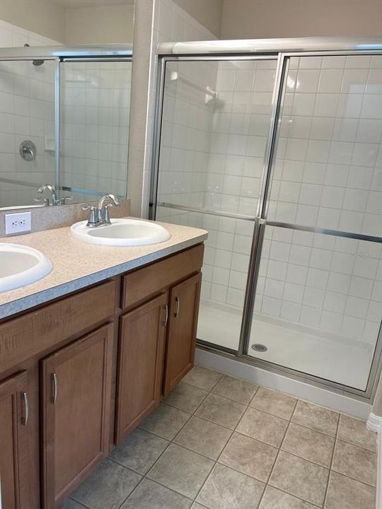 Master bath with shower and double vanity