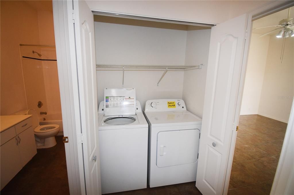 Laundry conveniently located in hallway