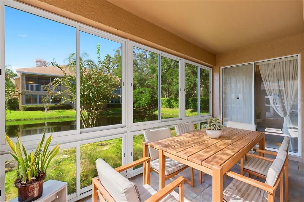 Lanai overlooks the pond, virtually staged