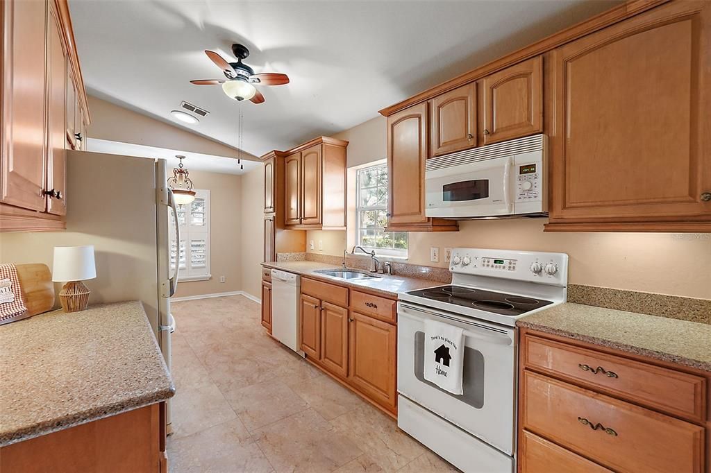 Wood cabinets with pull outs.