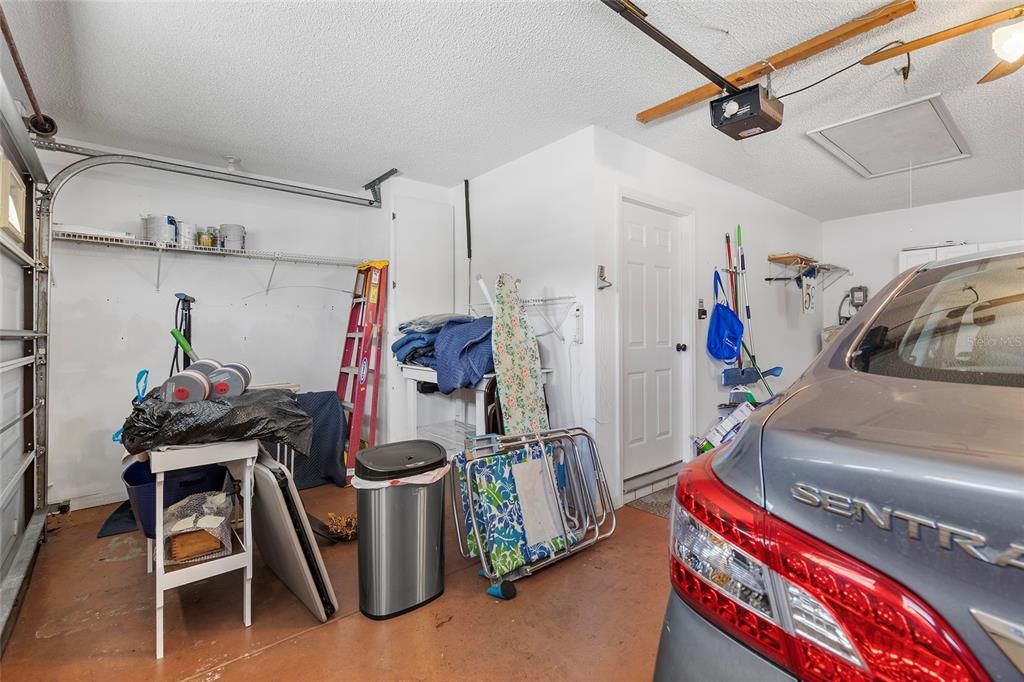 1.5 car garage with sliding screen doors over the garage door