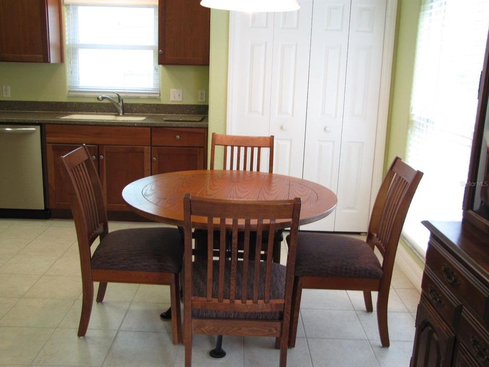 Eating area inside large Farmhouse-sized Kitchen