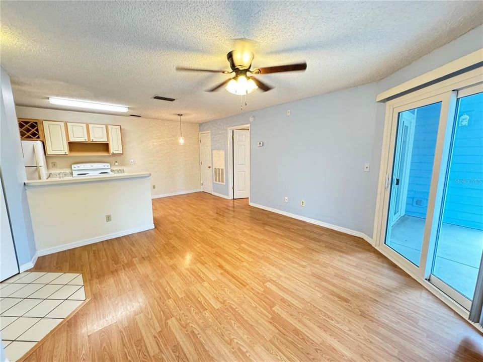 Living Room with large sliding glass doors leading out to balcony