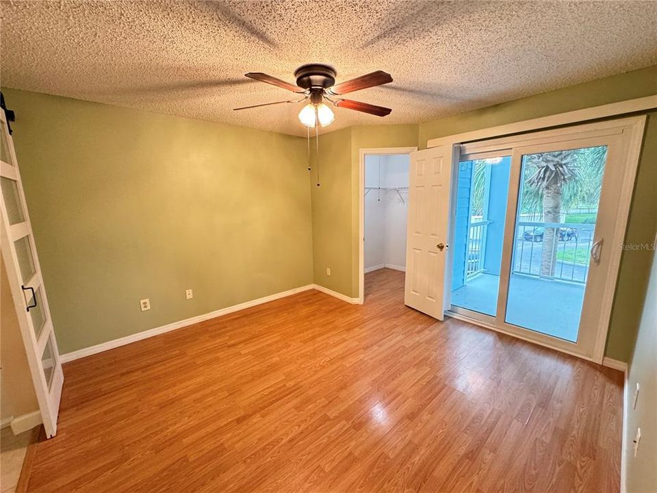 Master Bedroom with private balcony- Sliding glass doors and walk in closet