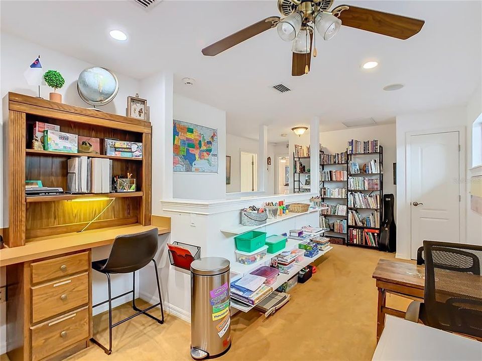 Upstairs, the loft area provides a versatile space  for study, entertainment or play.