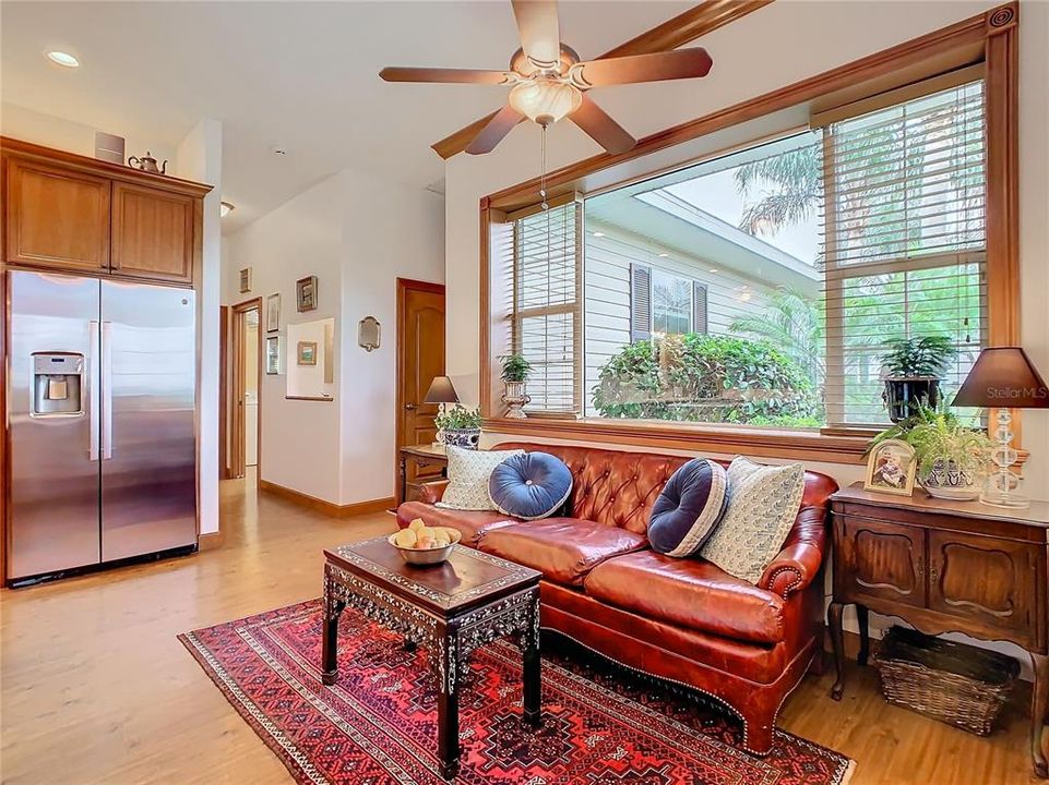 This sitting area (dinette area) has another large picture window that allows plenty of natural light plus a gorgeous view