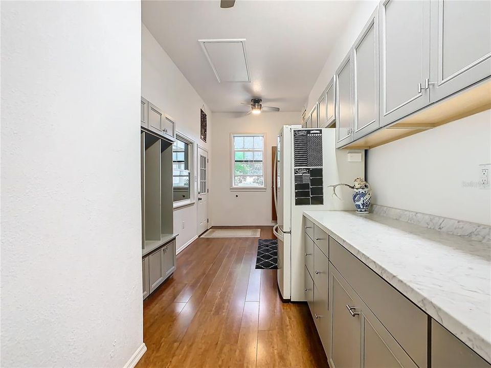 Mud-room offers plenty of storage and is easily accessible to both 2 car garages.