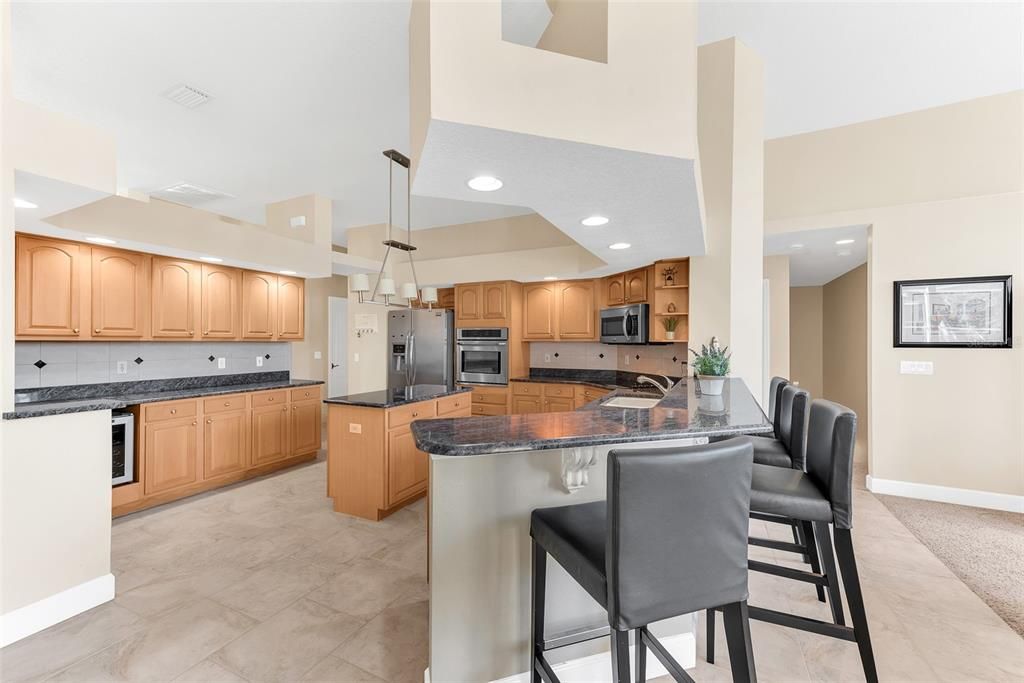 The breakfast bar that will accommodate at least 4 chairs