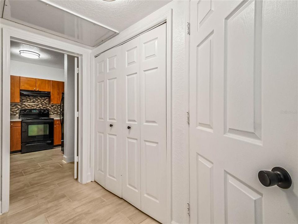 There is a closet for in-unit laundry and the primary bedroom has en-suite access to the full bath.