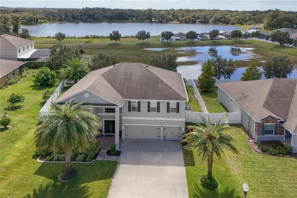 Just a few aerial shots of this home and a recap of the details: 1) an Oversized Premium Lot (.26 Acre)2) Fenced backyard with dbl gates to the nice size side yard, 3) conservation area (No rear neighbors) with views of Lake Shepard from the second story bedrooms.