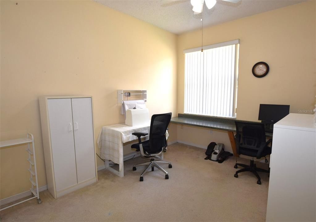 Bedroom 2 is currently used as an office & craft room.