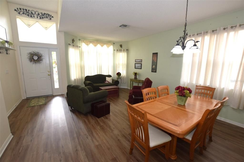 A sunlit entry way, with a spacious sunken living room & dining room can accommodate the larger gatherings and the need for a flexible floorplan.