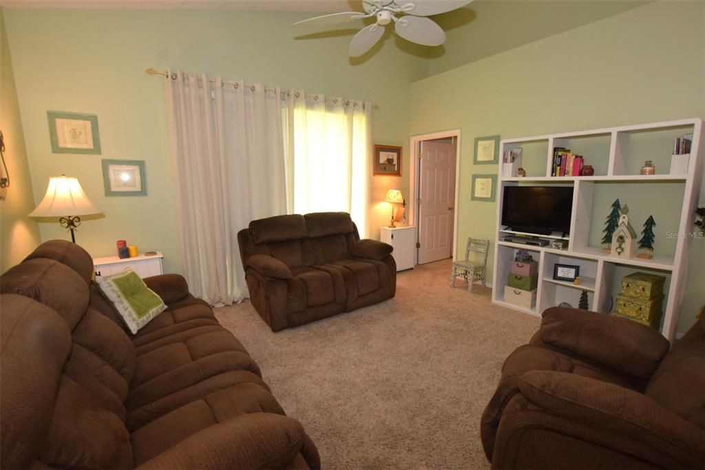 Family Room has access to backyard and conveniently located adjacent to the Owner's Suite.