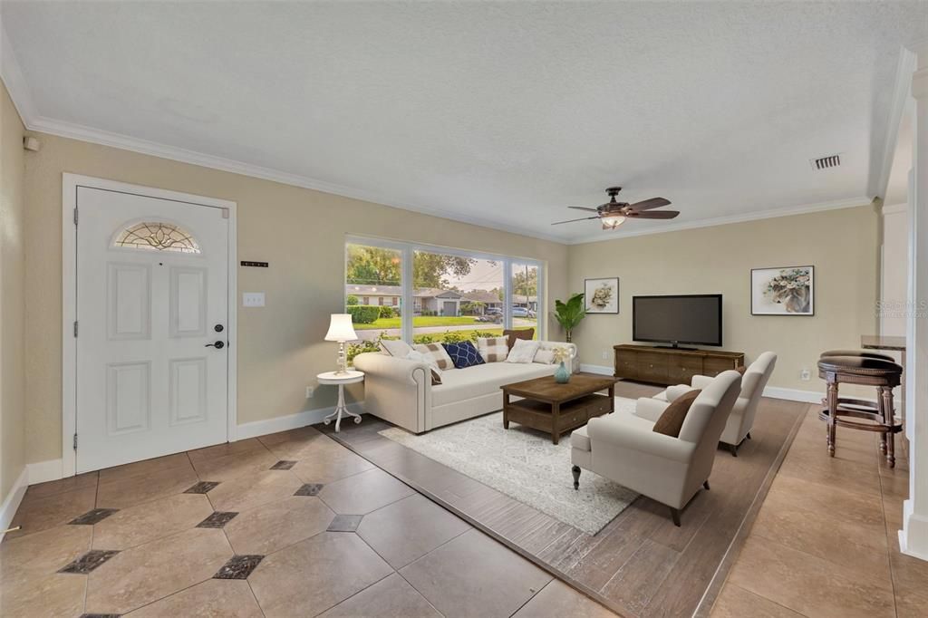 *Virtually staged* Large living room with picture windows