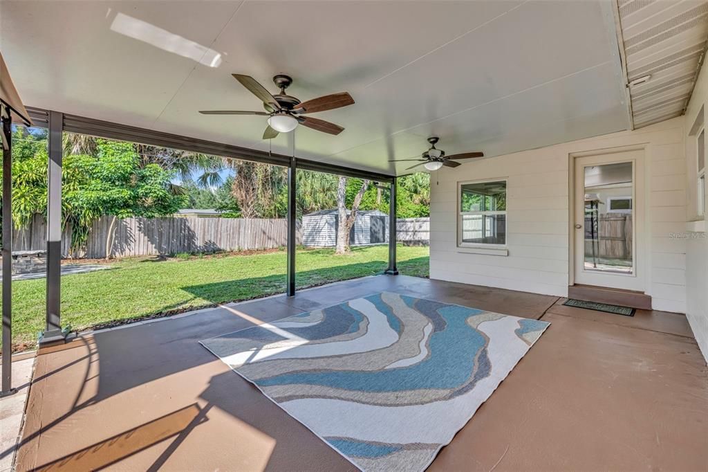 Rear porch (approx. 22'x15') with ceiling fans