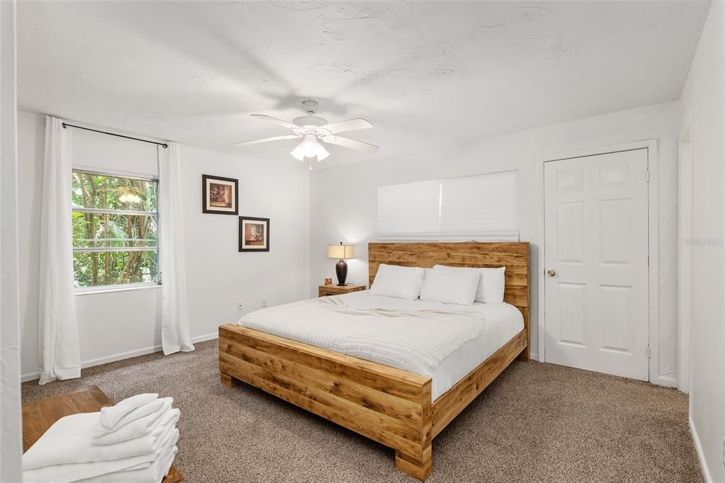 original primary bedroom walk-in closet and private entryway