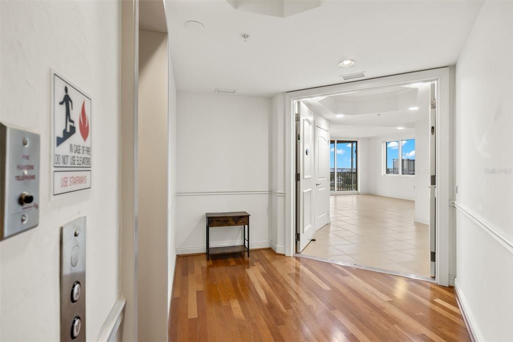 Foyer with elevator access to the unit