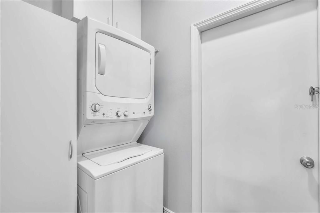 laundry room with storage