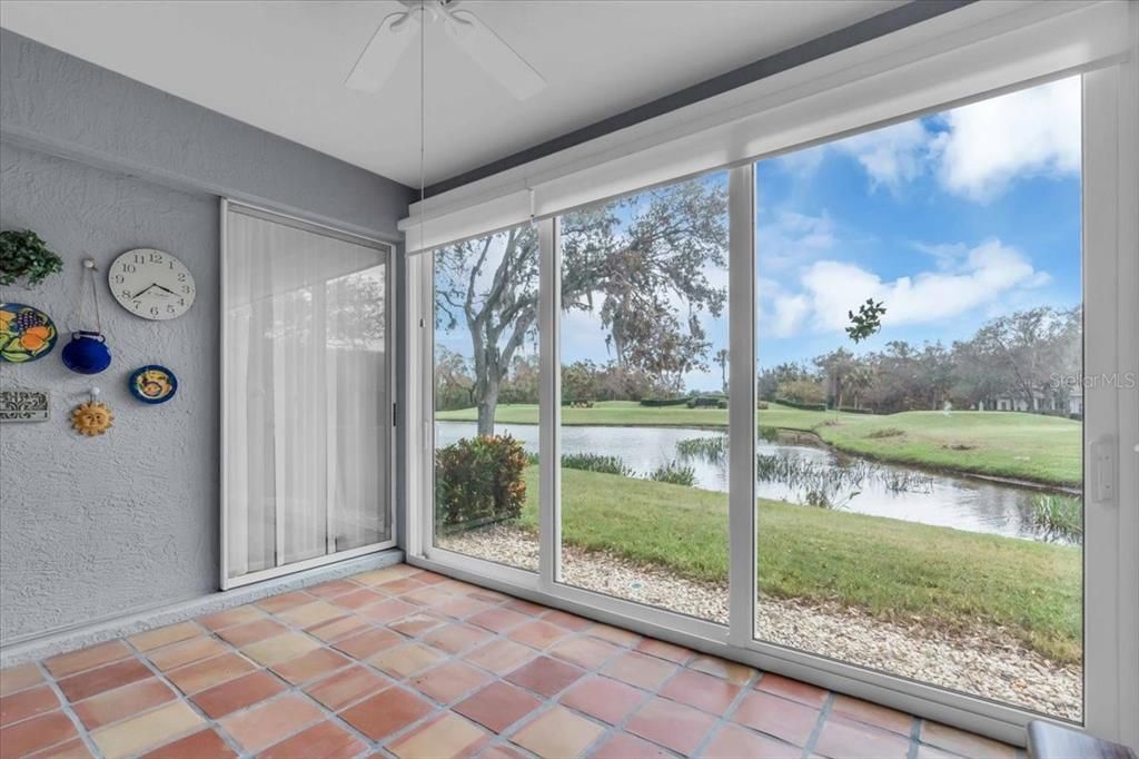 enclosed porch with tile flooring