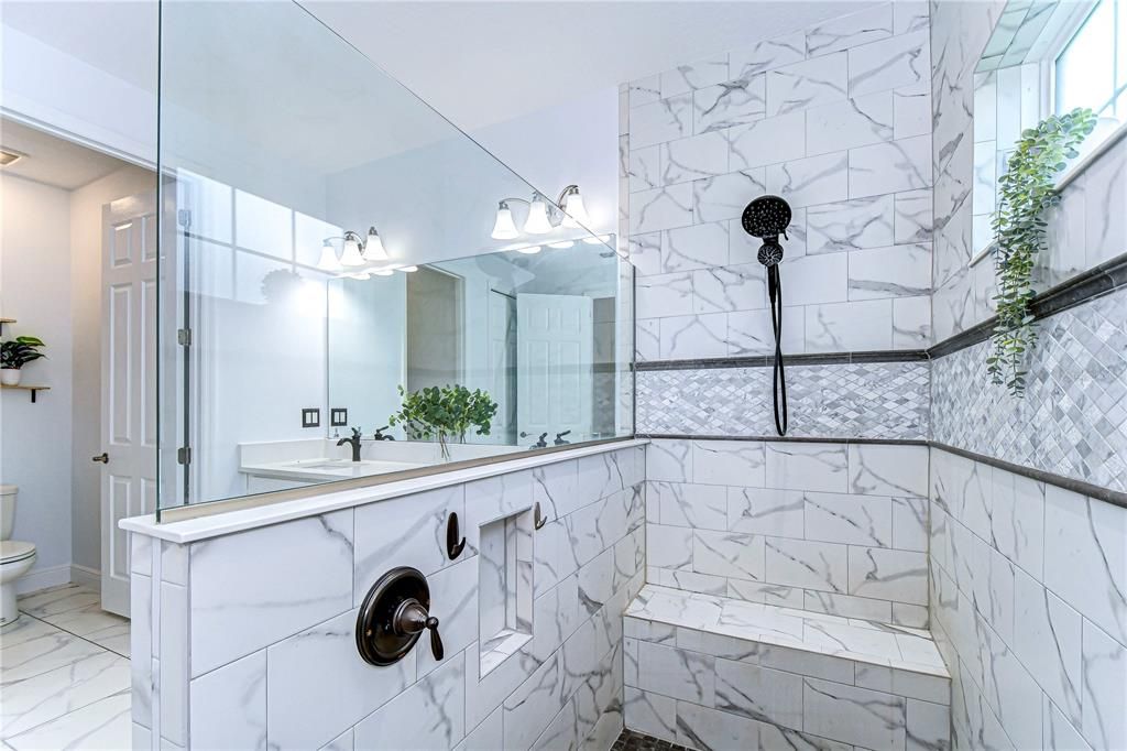 Dual-sink vanity and huge walk-in shower!