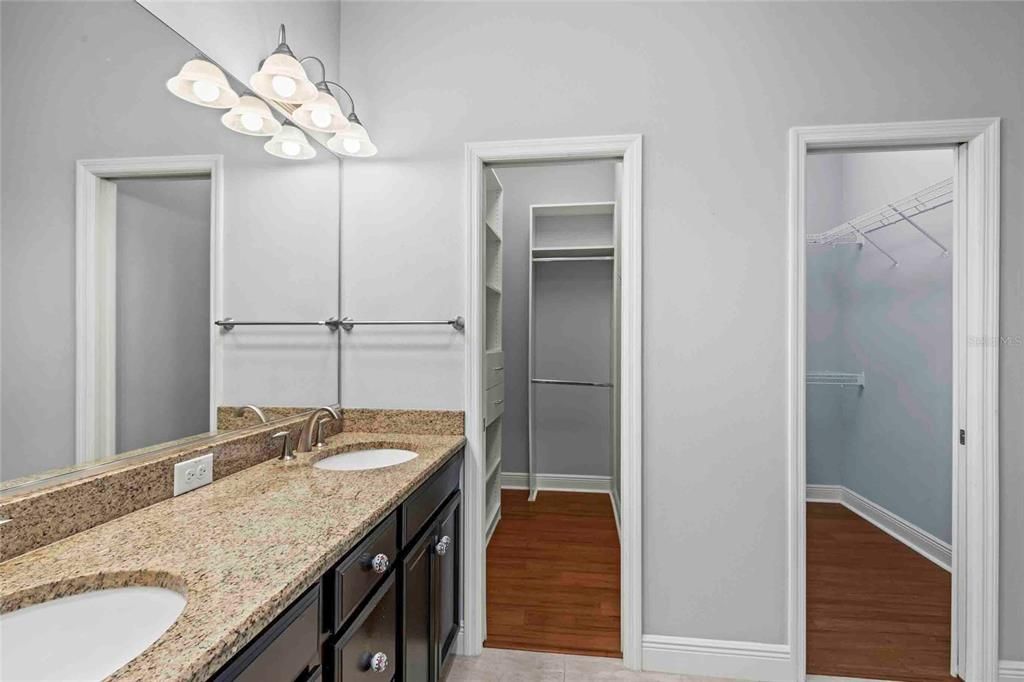 Primary Bathroom with two Walk-In Closets