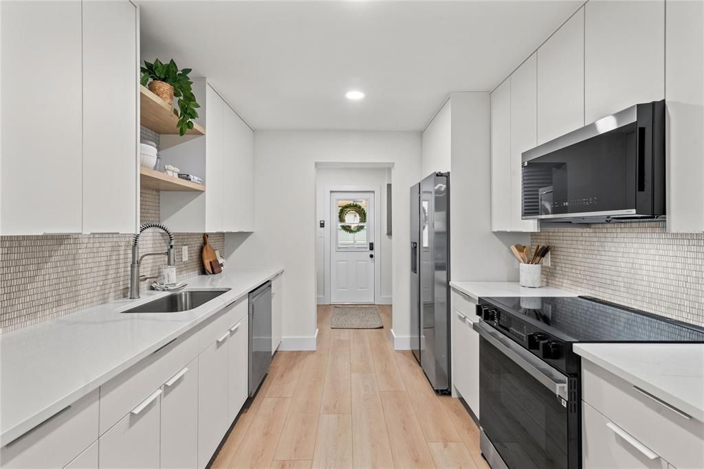 ALL NEW KITCHEN FEATURING MODERN WHITE CABINETS!