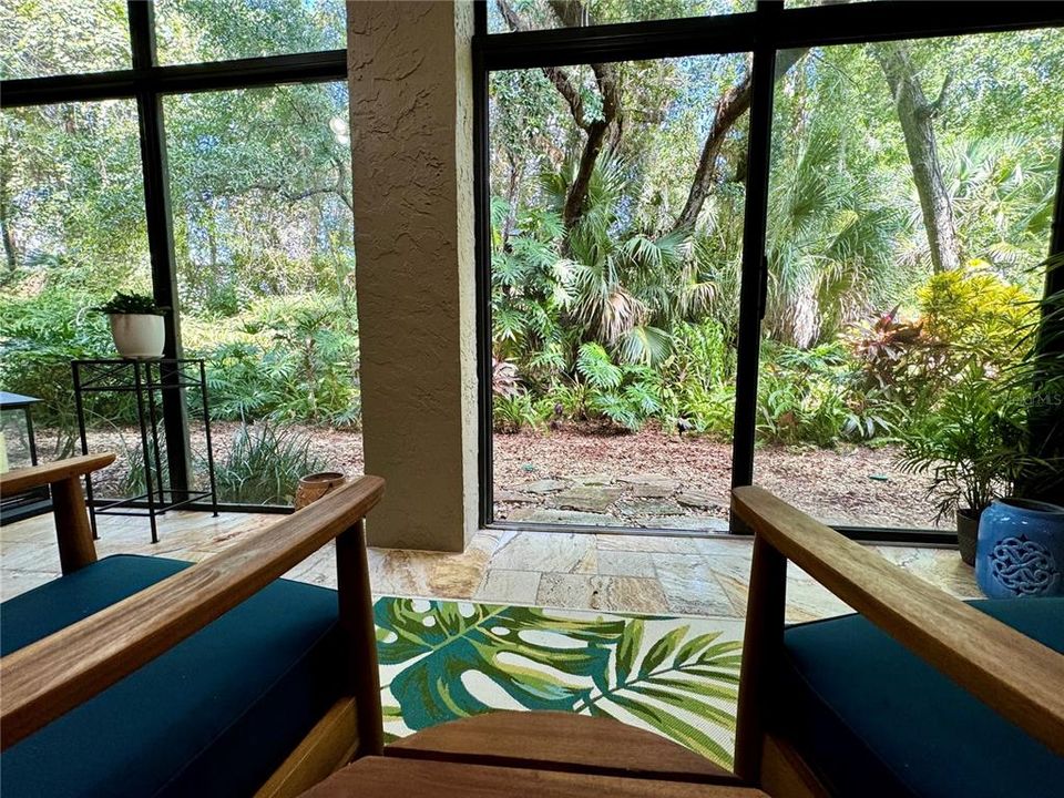 Back porch with sliding door access to the backyard