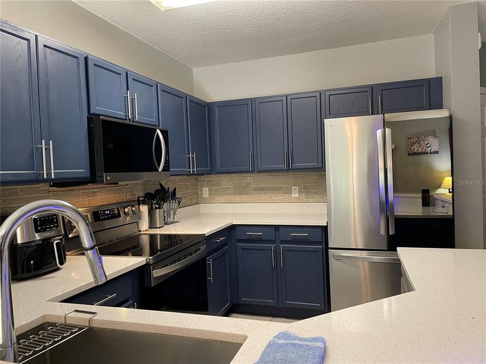 kitchen with beautifully updated appliances