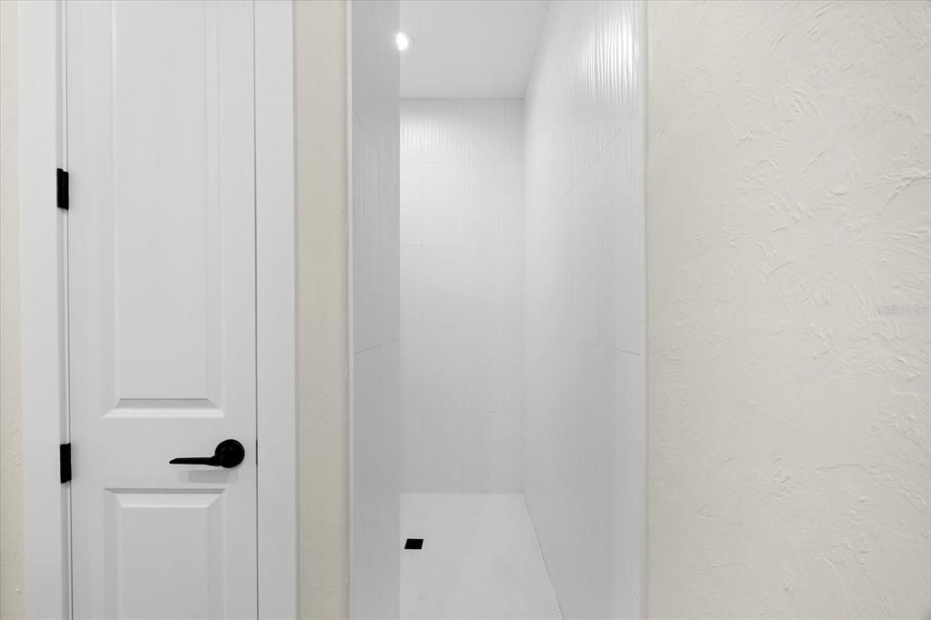 Primary Shower and Linen Closet