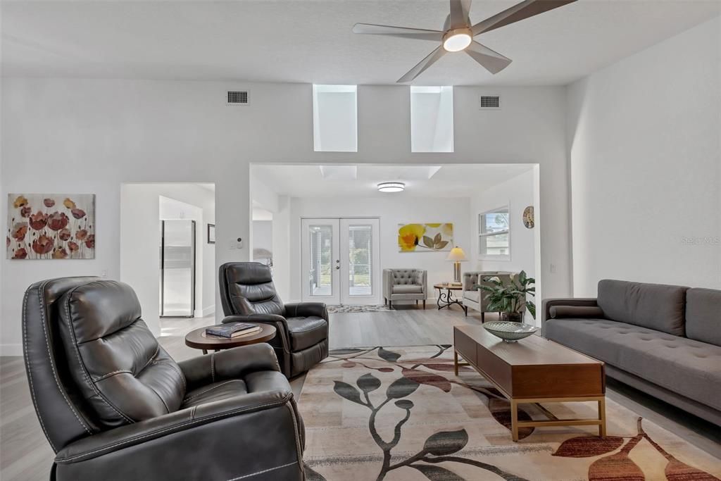 Living room with skylight windows