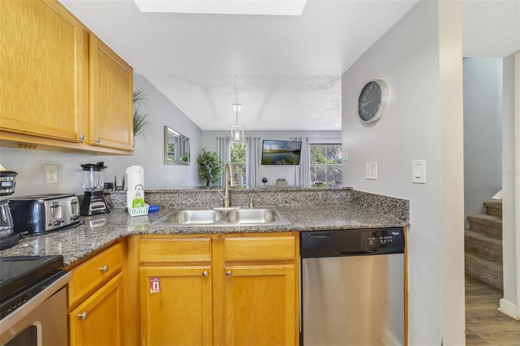 Kitchen has stainless steel appliances & granite counters!