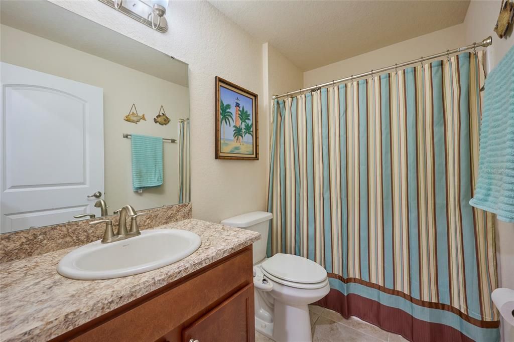 Guest bathroom with tub/shower combo